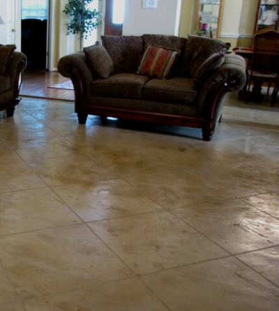 Living room with stamped and stained concrete floor