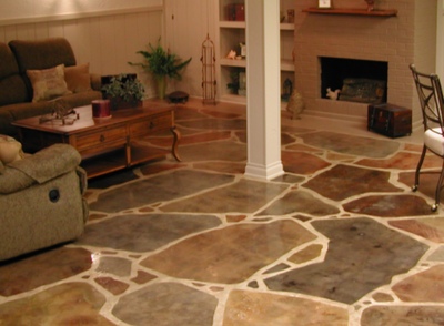 Great room with a multi-colored stone designed decorative concrete floor.