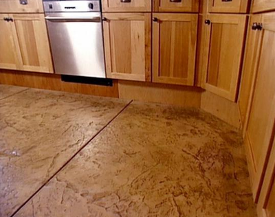 Textured concrete kitchen floor.