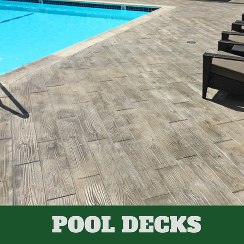 Grand Rapids stamped concrete pool surround with a wood grain finish.